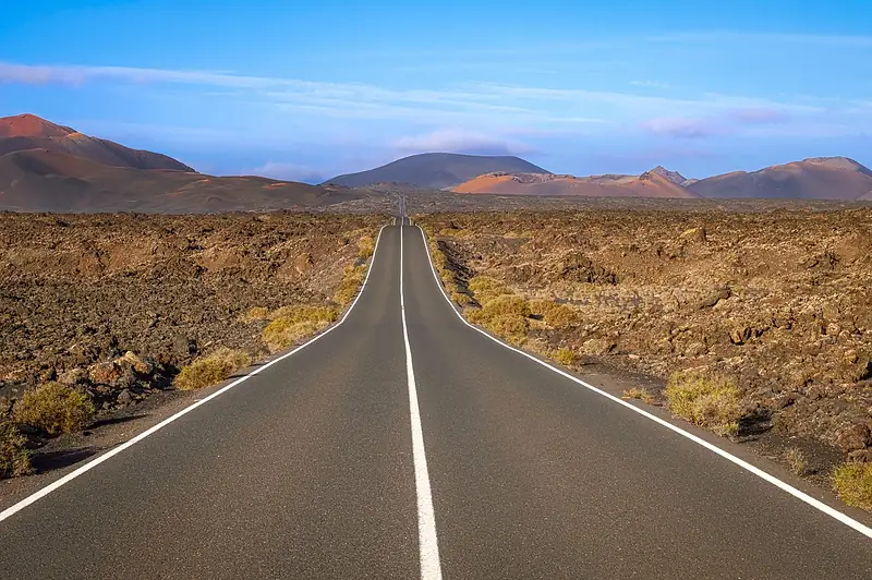 Road through the volcanic landscape of Lanzarote, Canary Islands